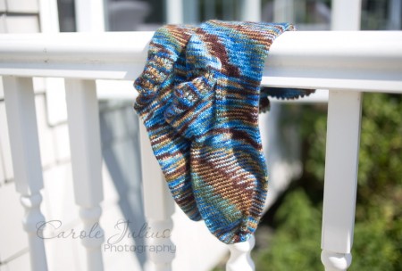 sea coast socks on railing for carole knits